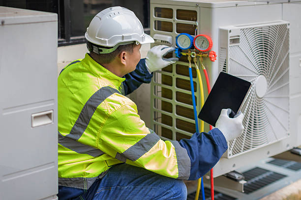 Professional Heat Pump Repair technician working in Paradise, TX